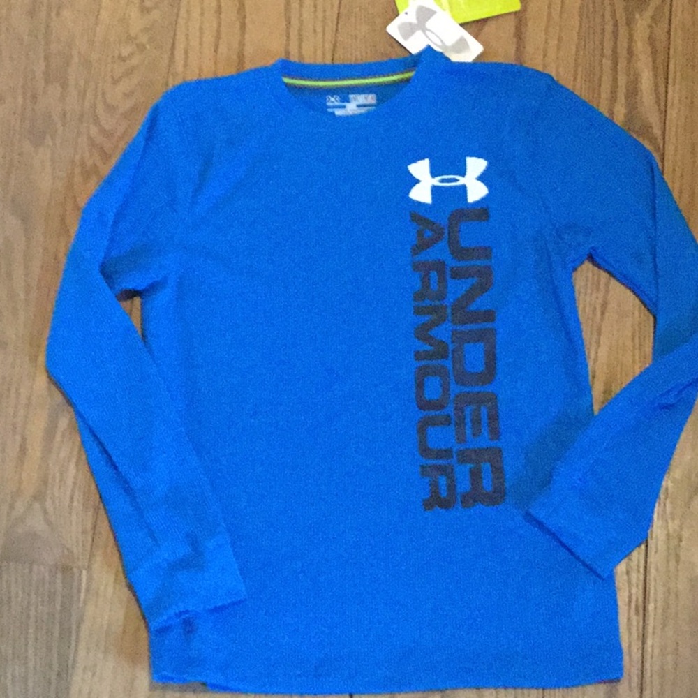 Under Armour shirt. In turquoise. Polyester